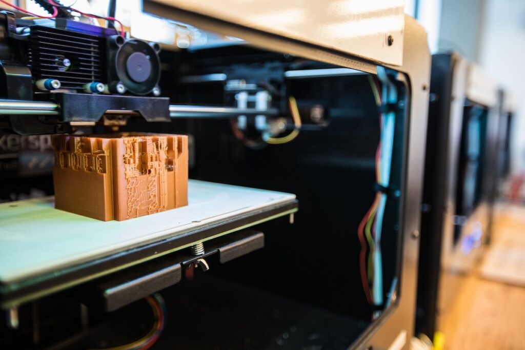A 3D printer creating an object.