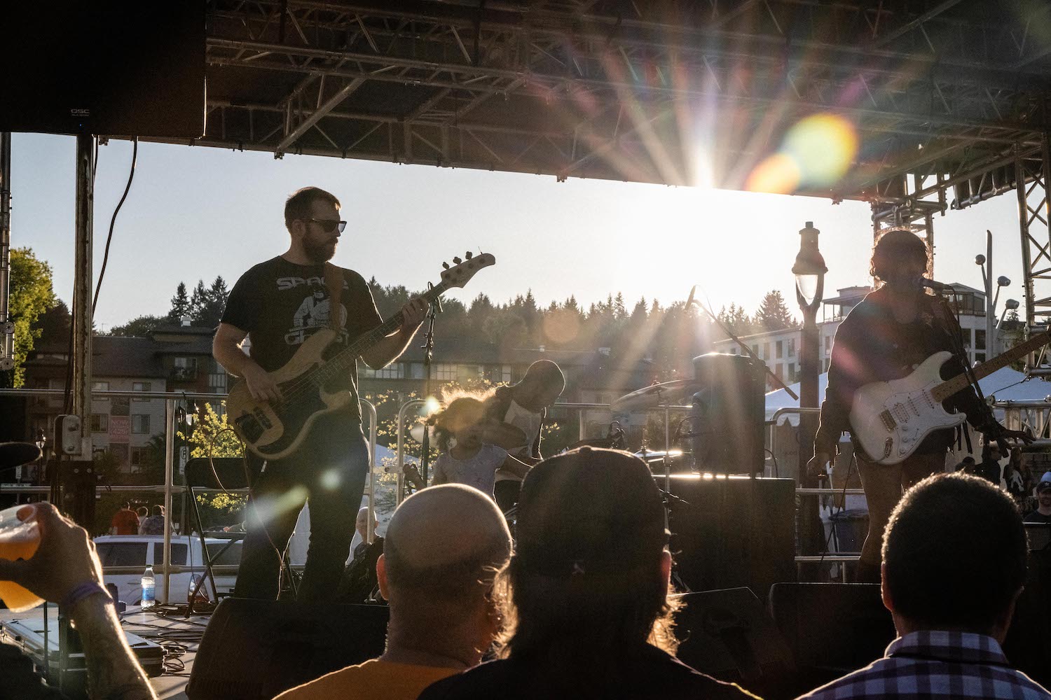 Musicians playing to a crowd at Block Party