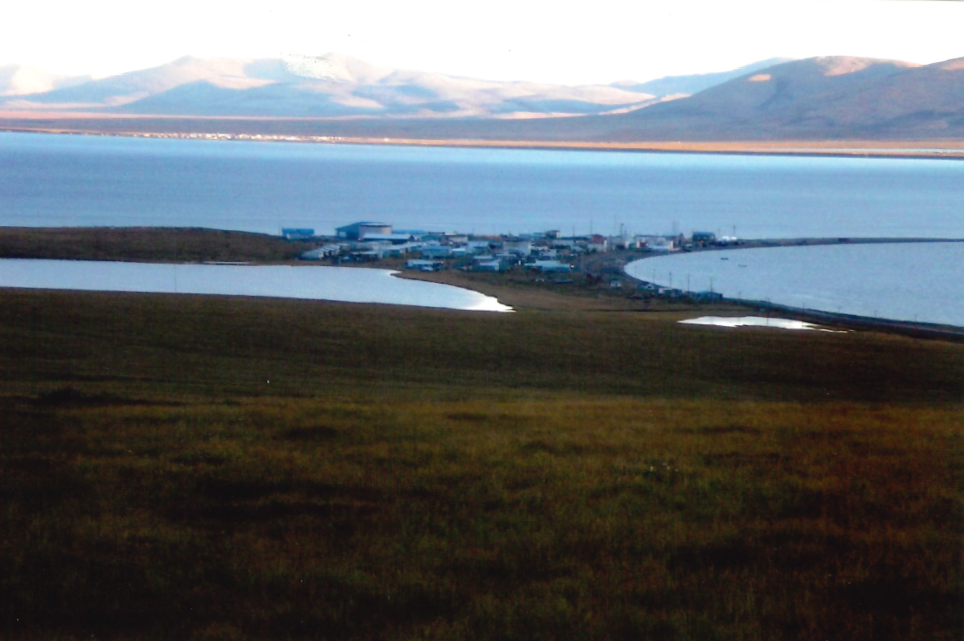 A small town on a sandpit, surrounded on three sides by water