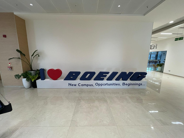 An I Love Boeing sign in the hallway of a Boeing building.