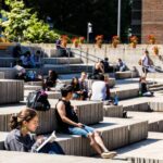 Students sitting in the UW Bothell Plaza