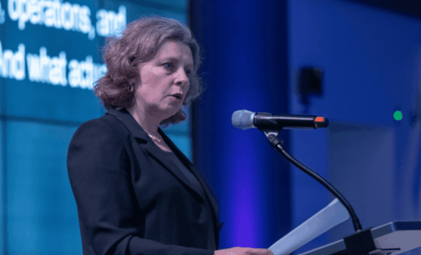 Dr. Sophie Leroy, Dean of UW Bothell School of Business, speaking at Avanade Executive Summit for Gates Foundation.