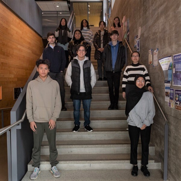 Digital Scholars 2022 group photo standing on stairs at campus