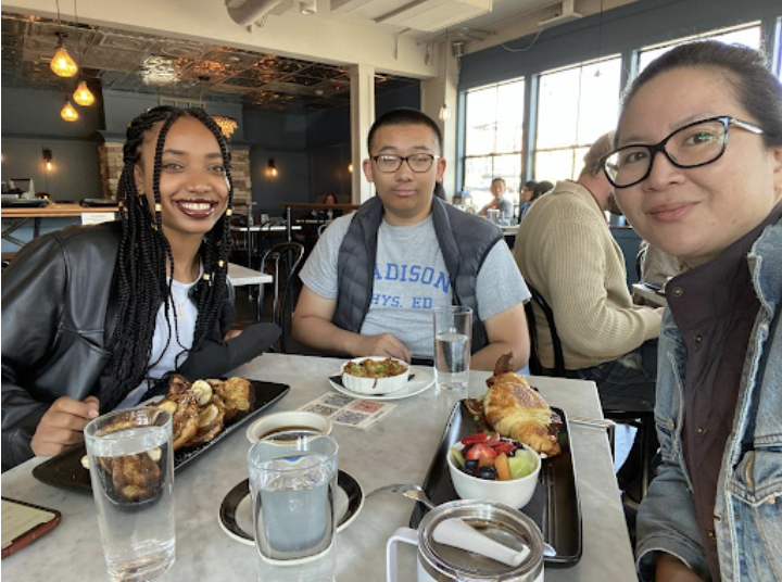 Digital Scholars, Beth Anulo and Houming Ge, with internship site supervisor, Nancy Chang, Director of Digital Navigation Services with Goodwill of the Olympics and Rainier Region.