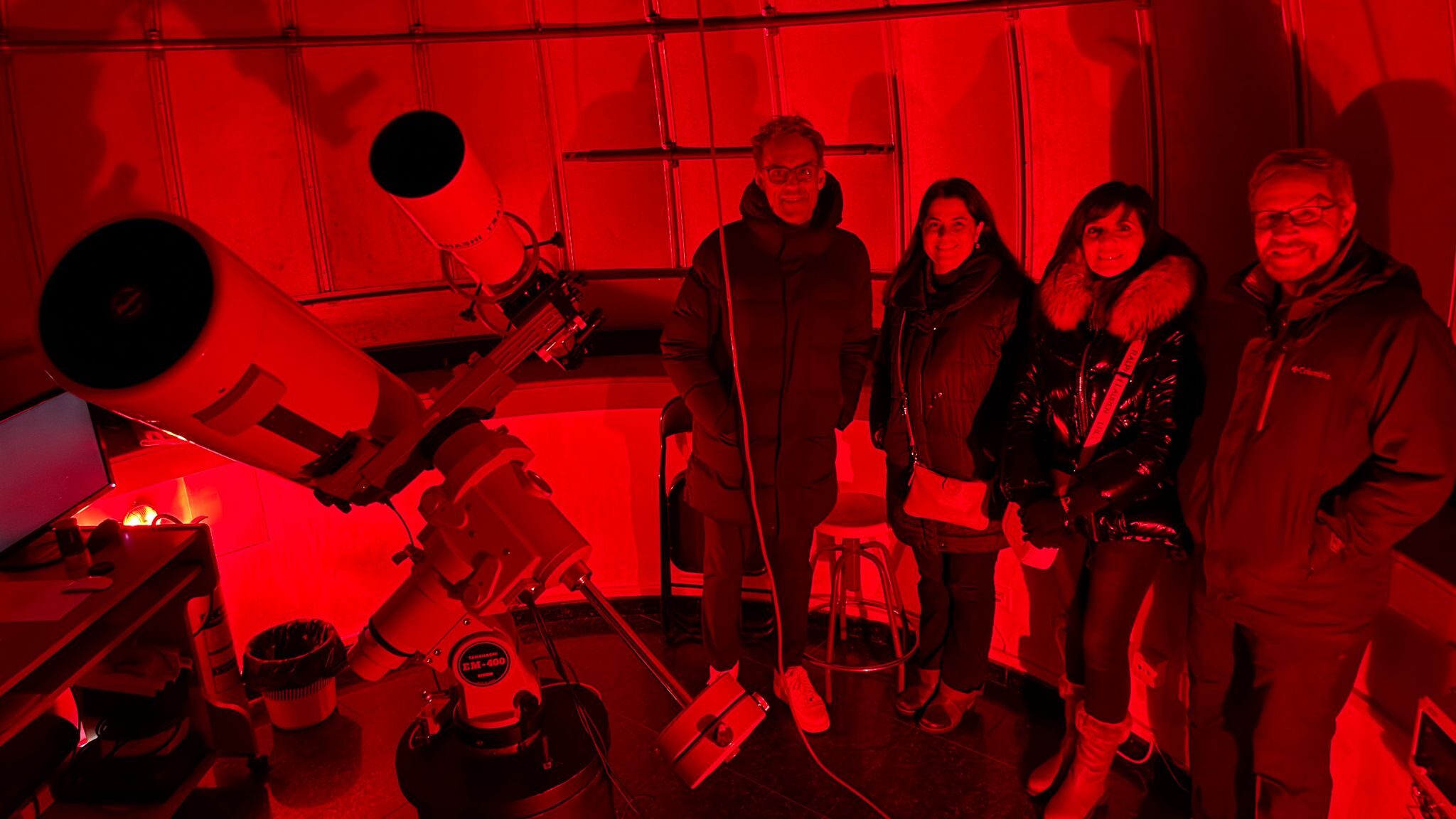 Santos Rodríguez, Coordinator of the UW León Center (left) and his partner (second from right); Paola Rodríguez Hidalgo (STEM), second from left; and David Goldstein (IAS), far right, at the Pedro Duque Municipal Astronomical Observatory in León, Spain.