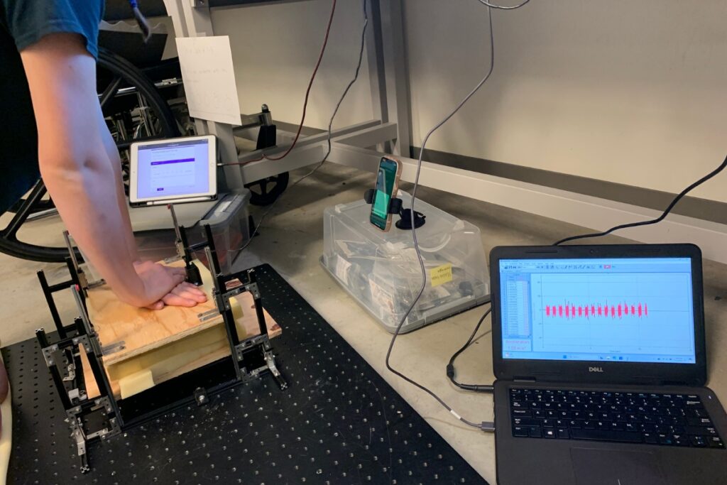 A person tests a CPR device