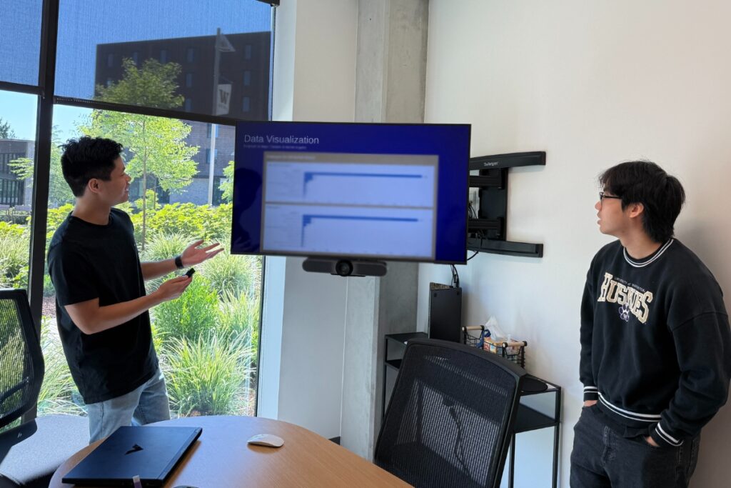 Two students are doing a presentation