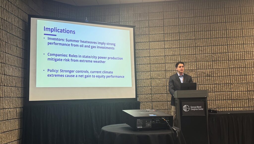 Thomas giving presentation and showing slides