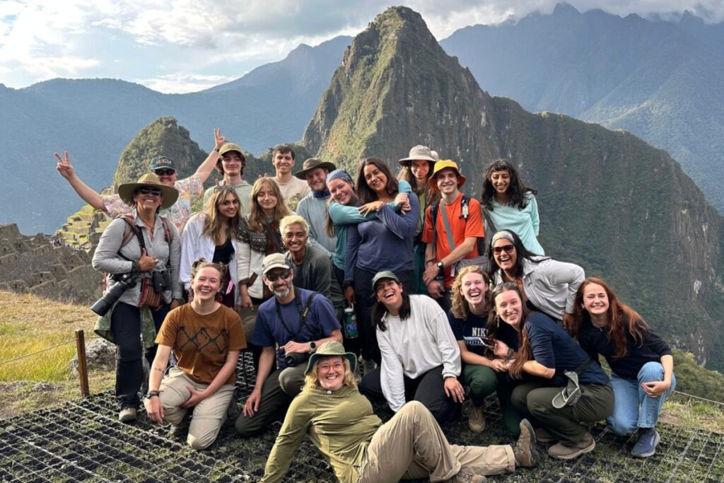 students take picture together in Peru