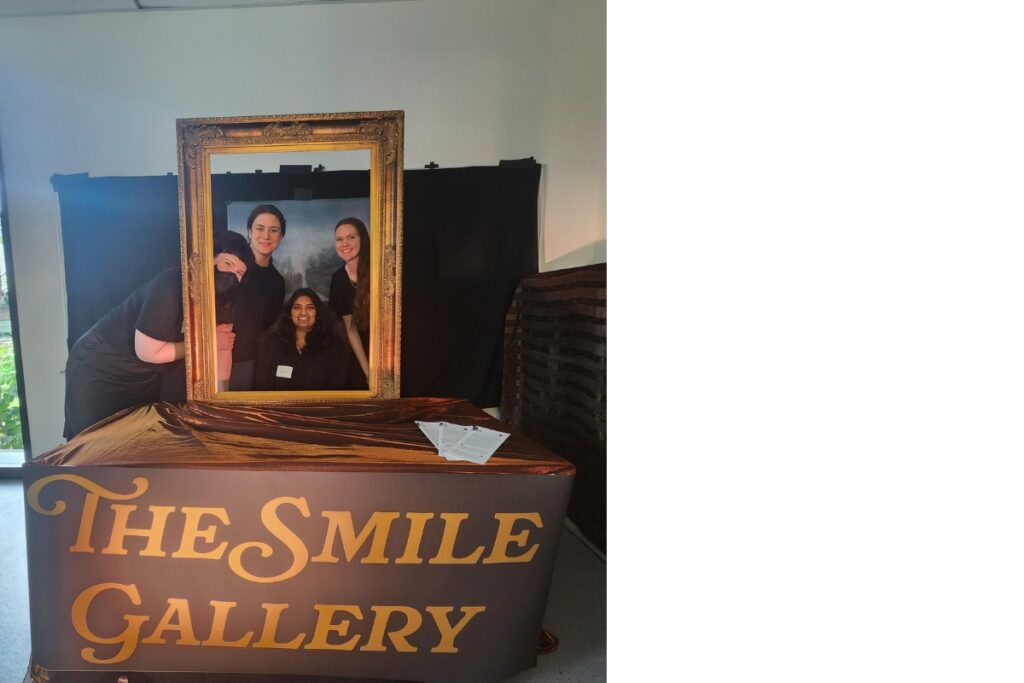 Art installation where people can take a Mona Lisa-type photo with a frame in front and a blurry landscape canvas behind.