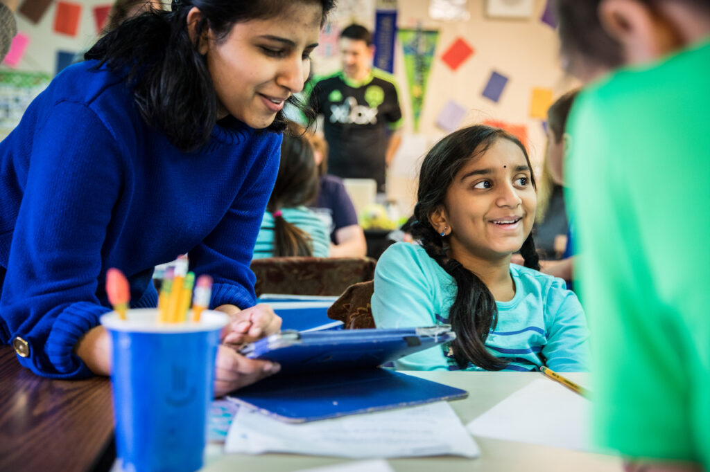 SES teacher candidate supporting elementary school student