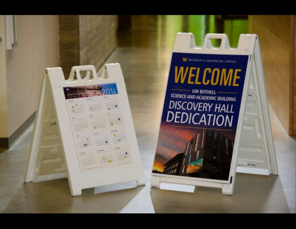Small and large sandwich boards showing examples of advertising content