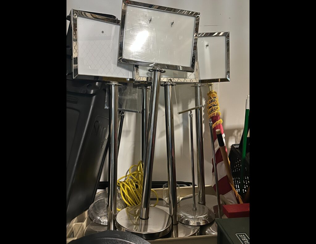 blank sign holders on stands