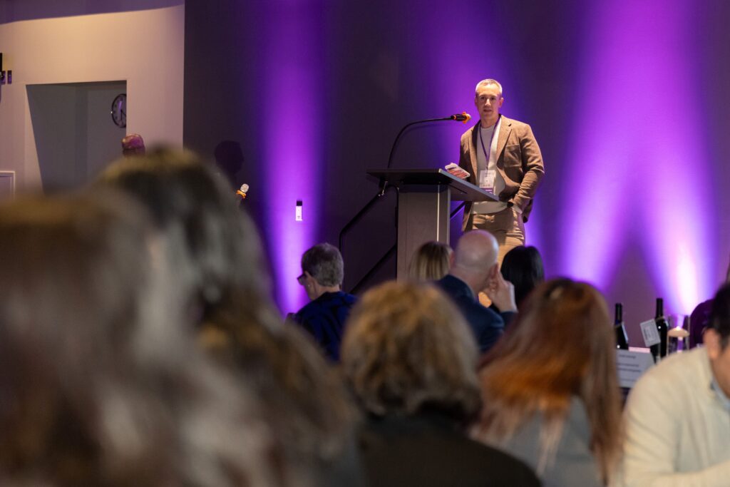 speaker on stage at the (un)GALA