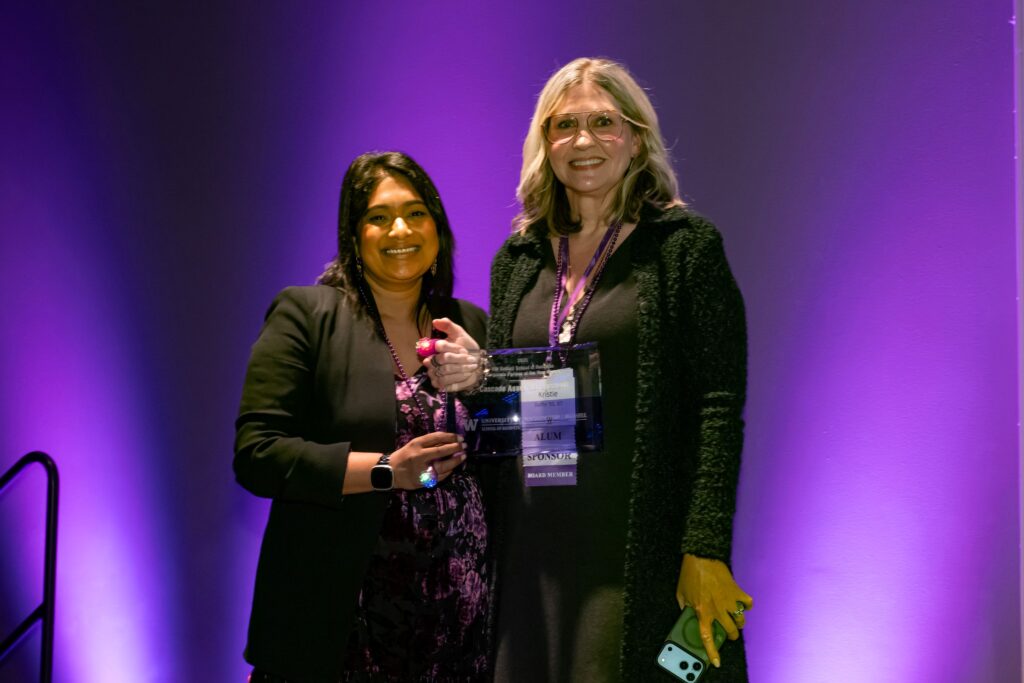 Kristie Duffin of Cascade Asset Management accepting the Business Partner of the Year award