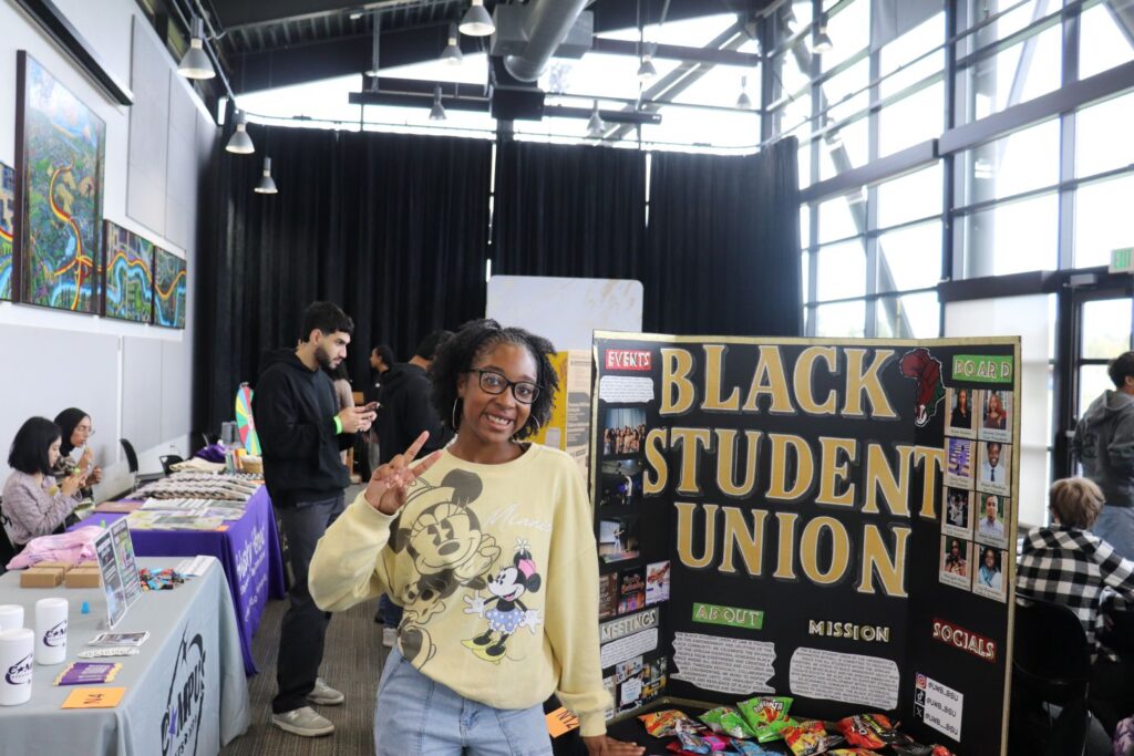 Hicks at a tabling event representing the Black Student Union