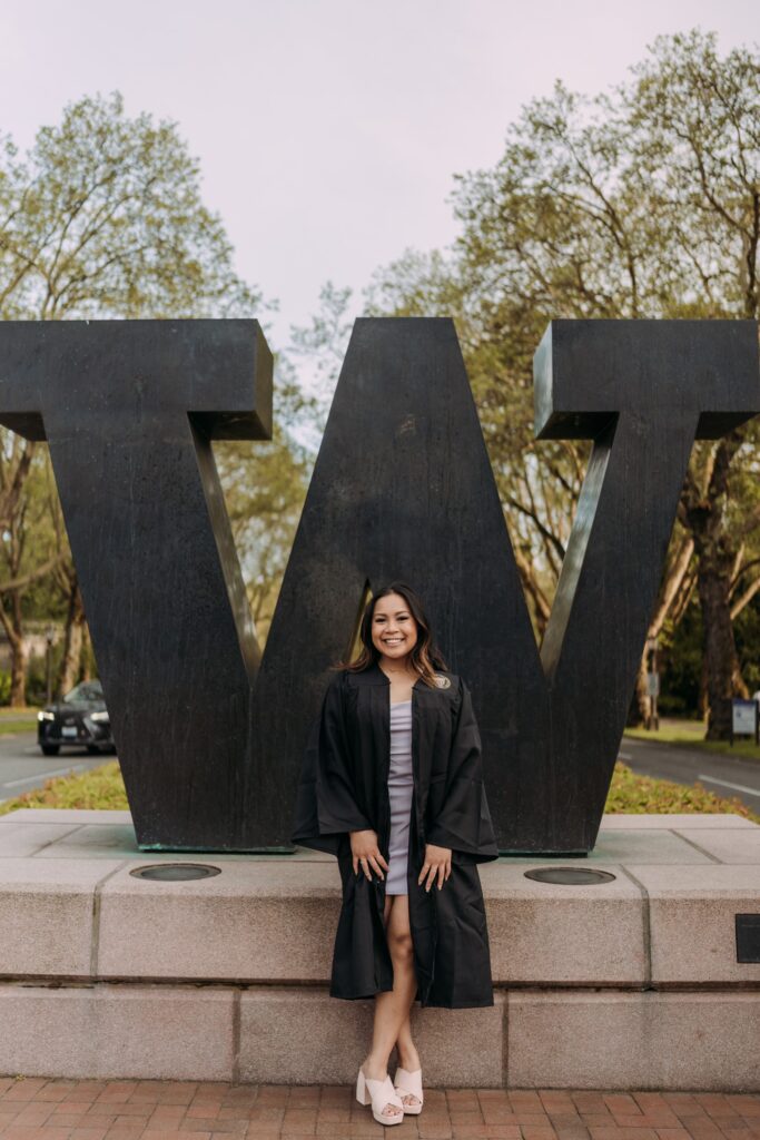 Headshot of Olivya Cerdinio in front of W statue