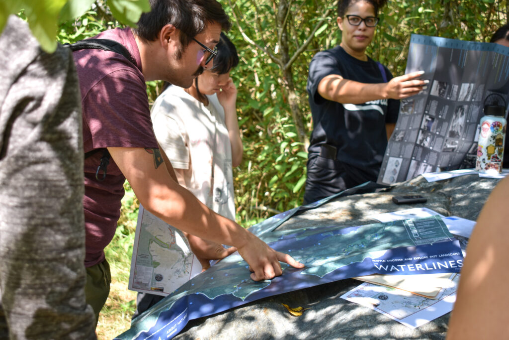 People looking at maps.