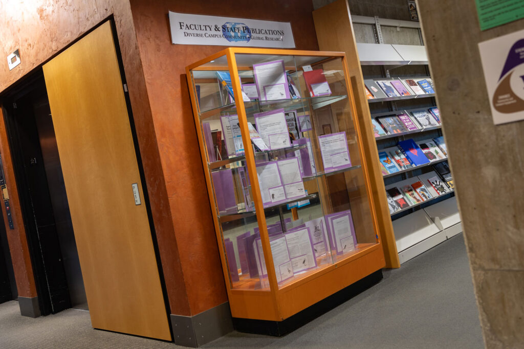 A bookshelf in a library.