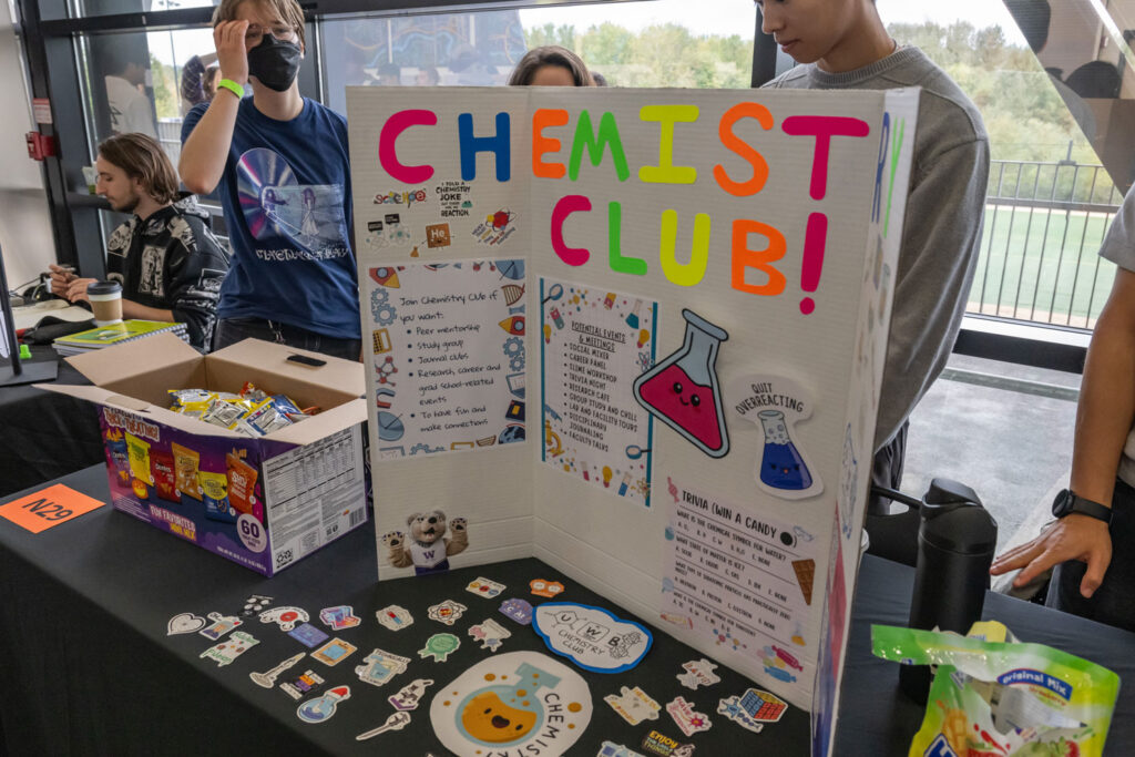 A poster board for a Chemistry Club at a club fair event.