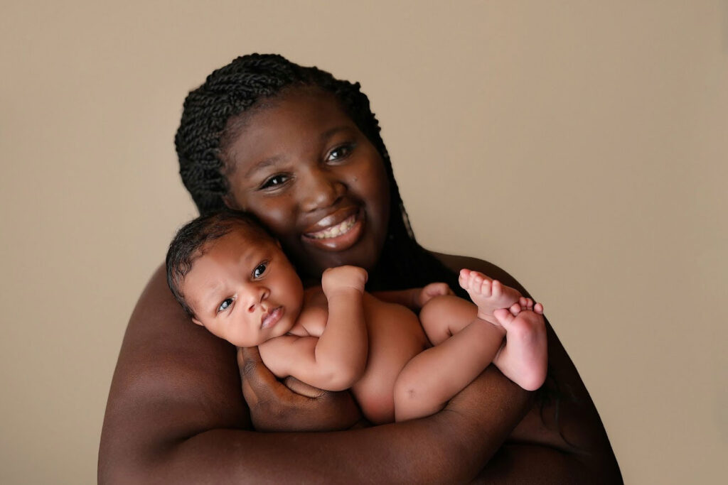 A person holding a baby.