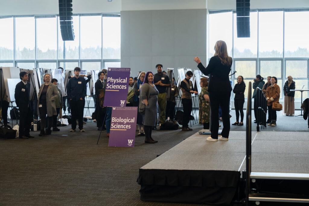 An event where people are presenting posters.