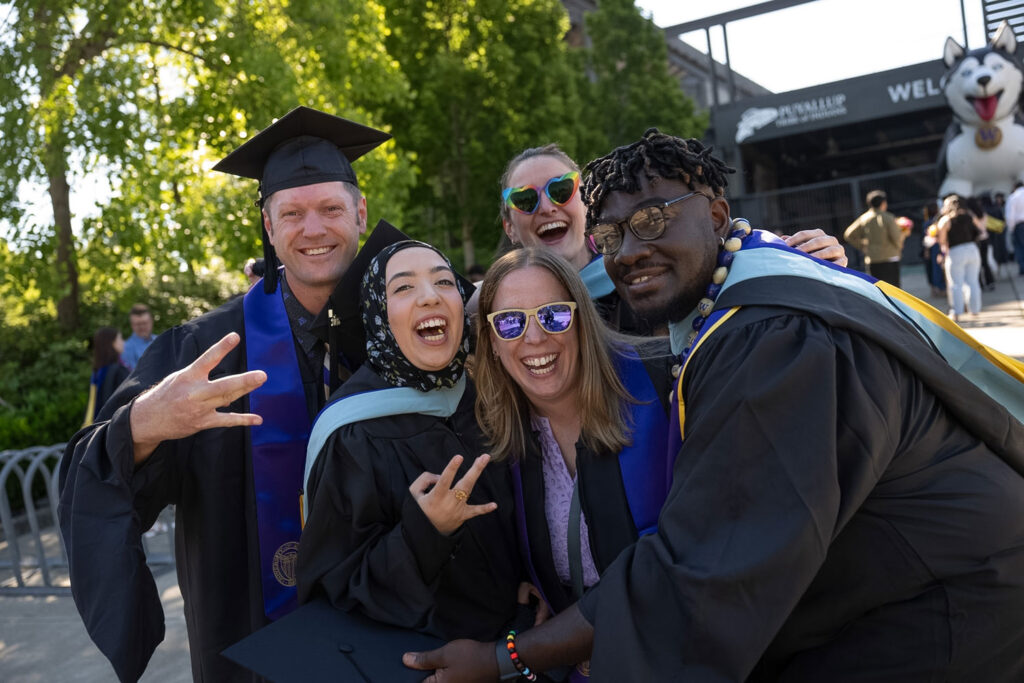 A group of people in graduation attire.