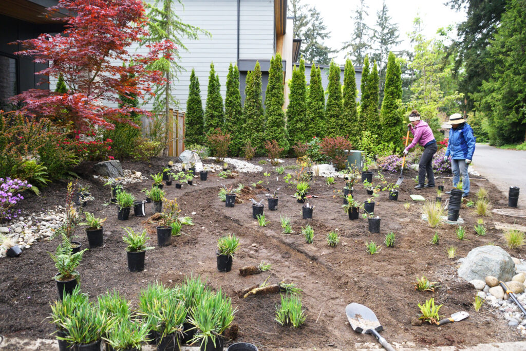 People doing yard work.