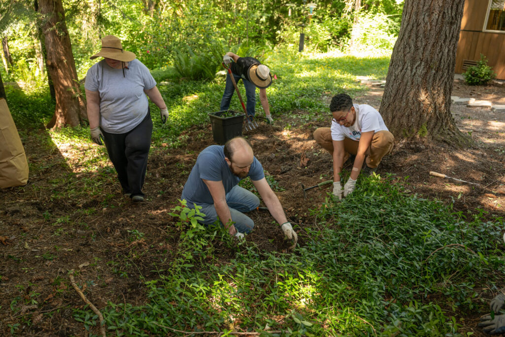 People doing yard work.