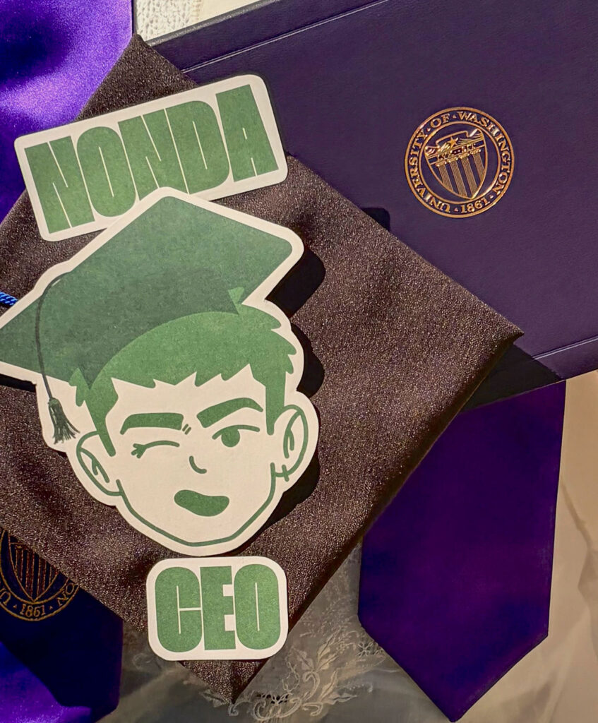 A log for "Nonda" next to a diploma.