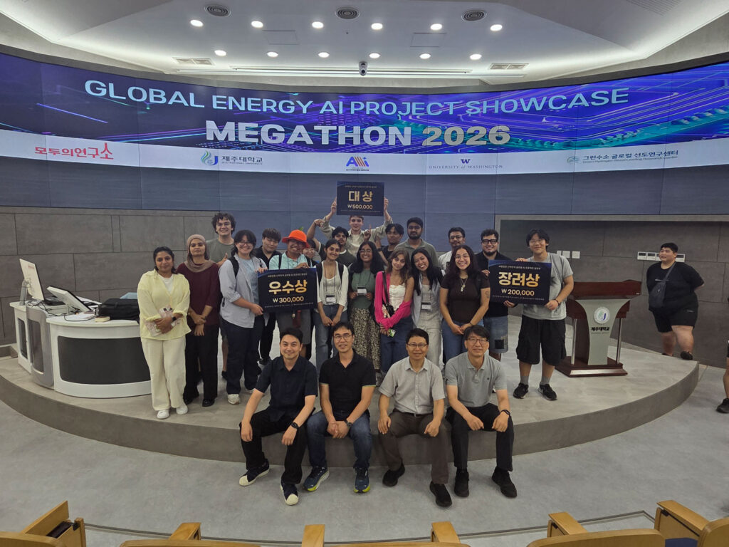 A group of people pose together.