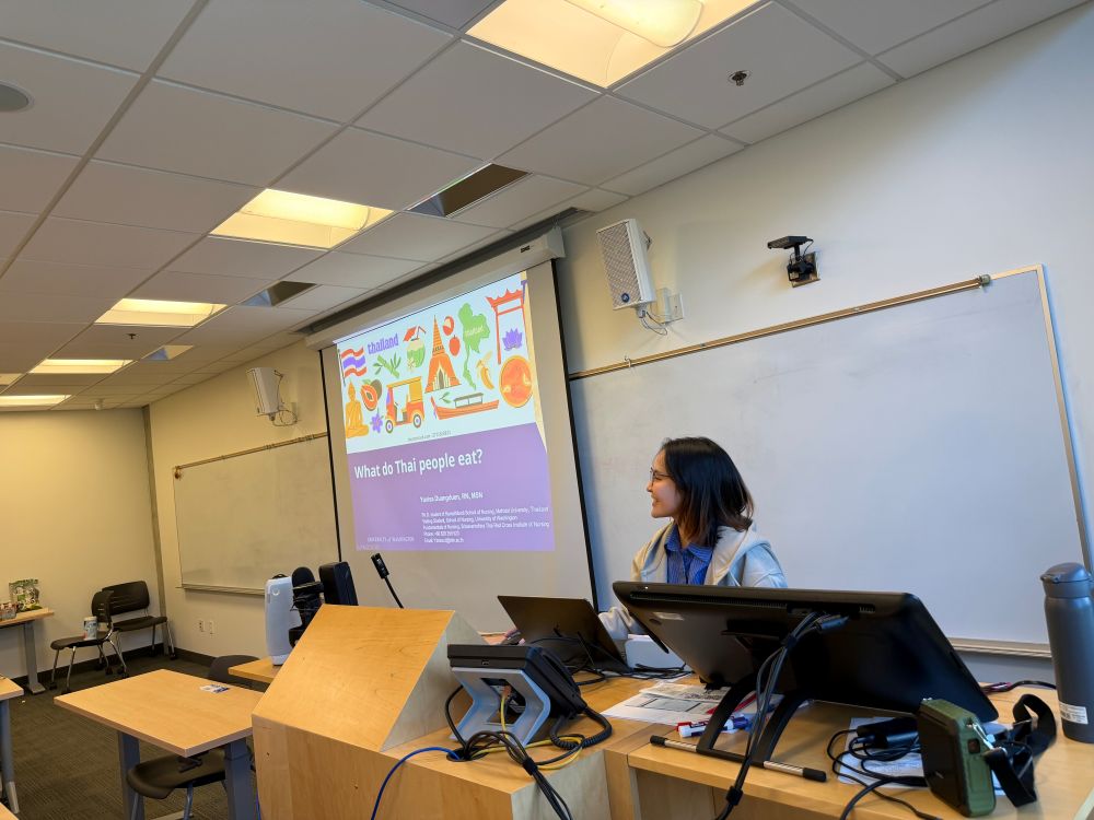 presenter at podium lecturing class