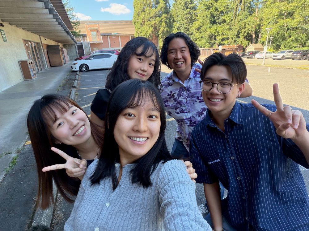 group of students and faculty taking a selfie