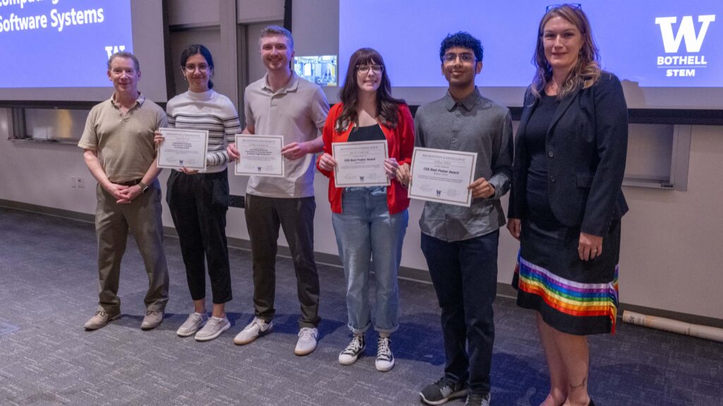 CSS division chair, four students with certificates and the dean