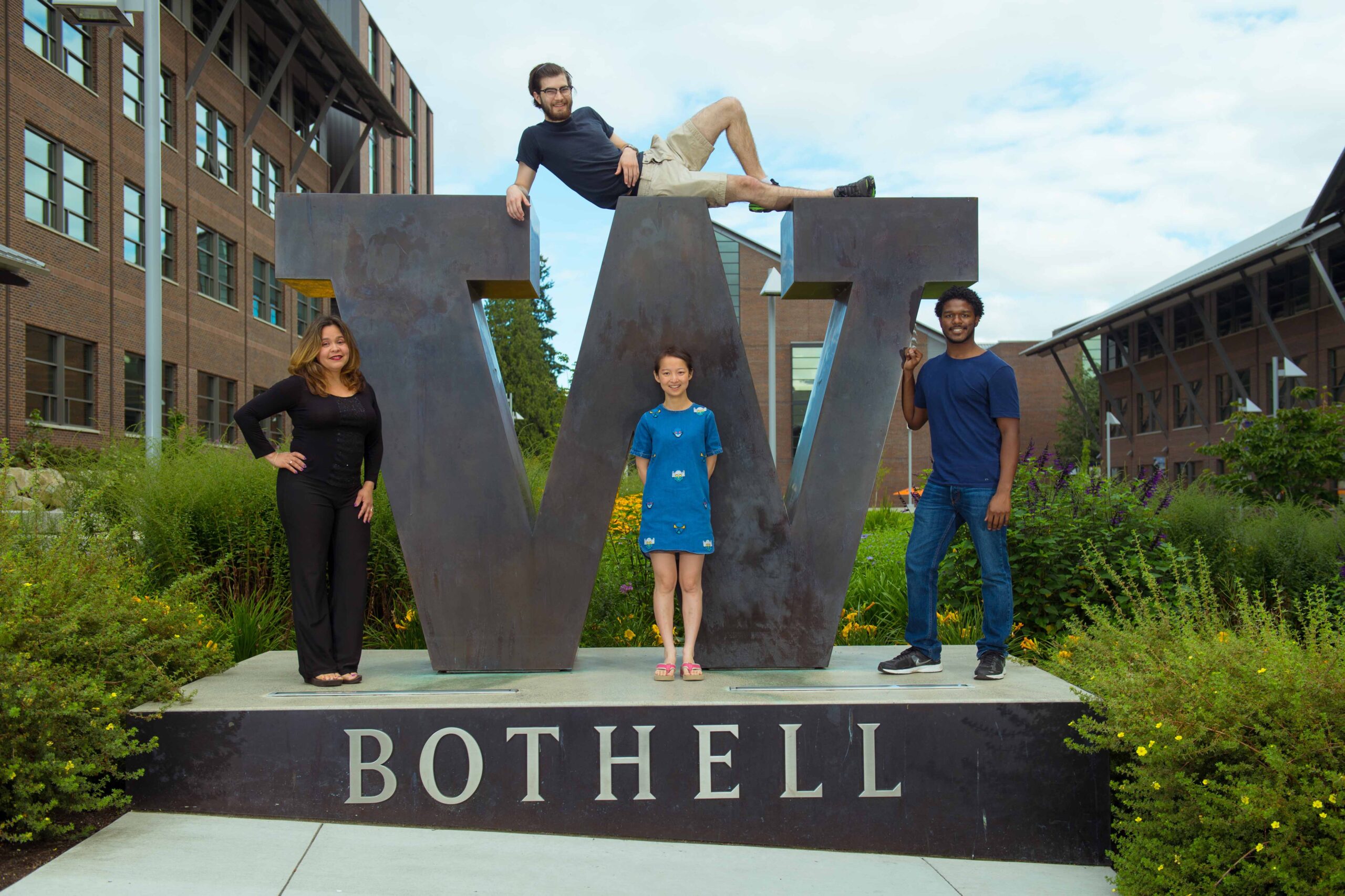 Optimization group photo at the W Bothell statue