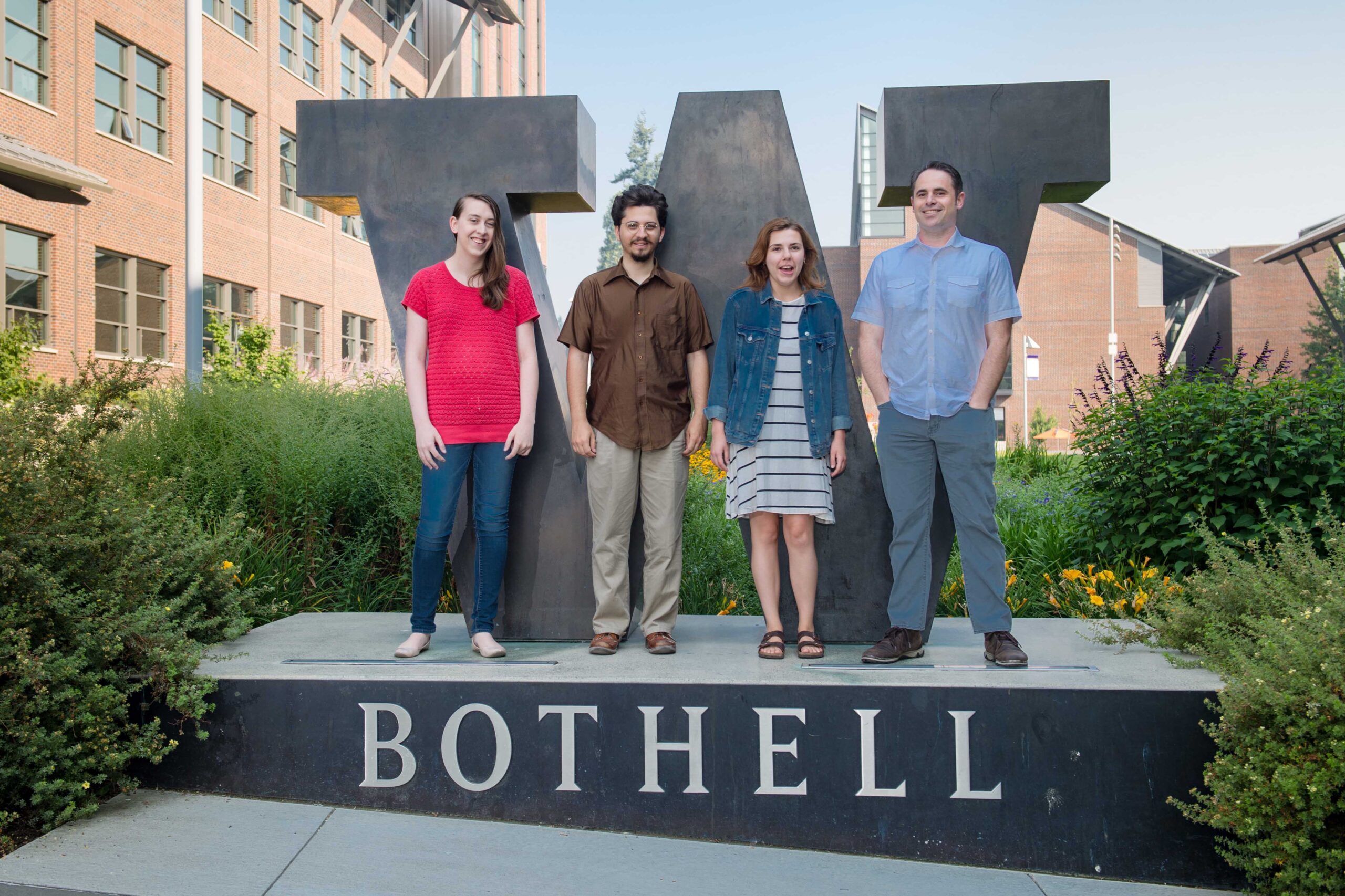 Matrix Analysis group photo at the W Bothell statue