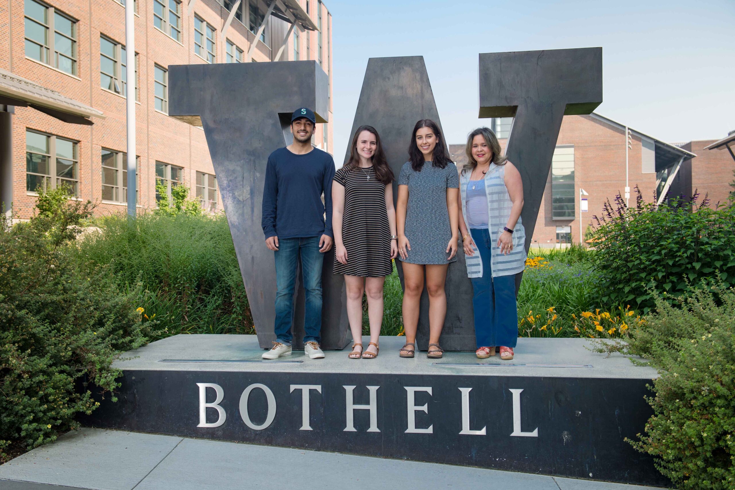 Optimization group photo at the W Bothell statue