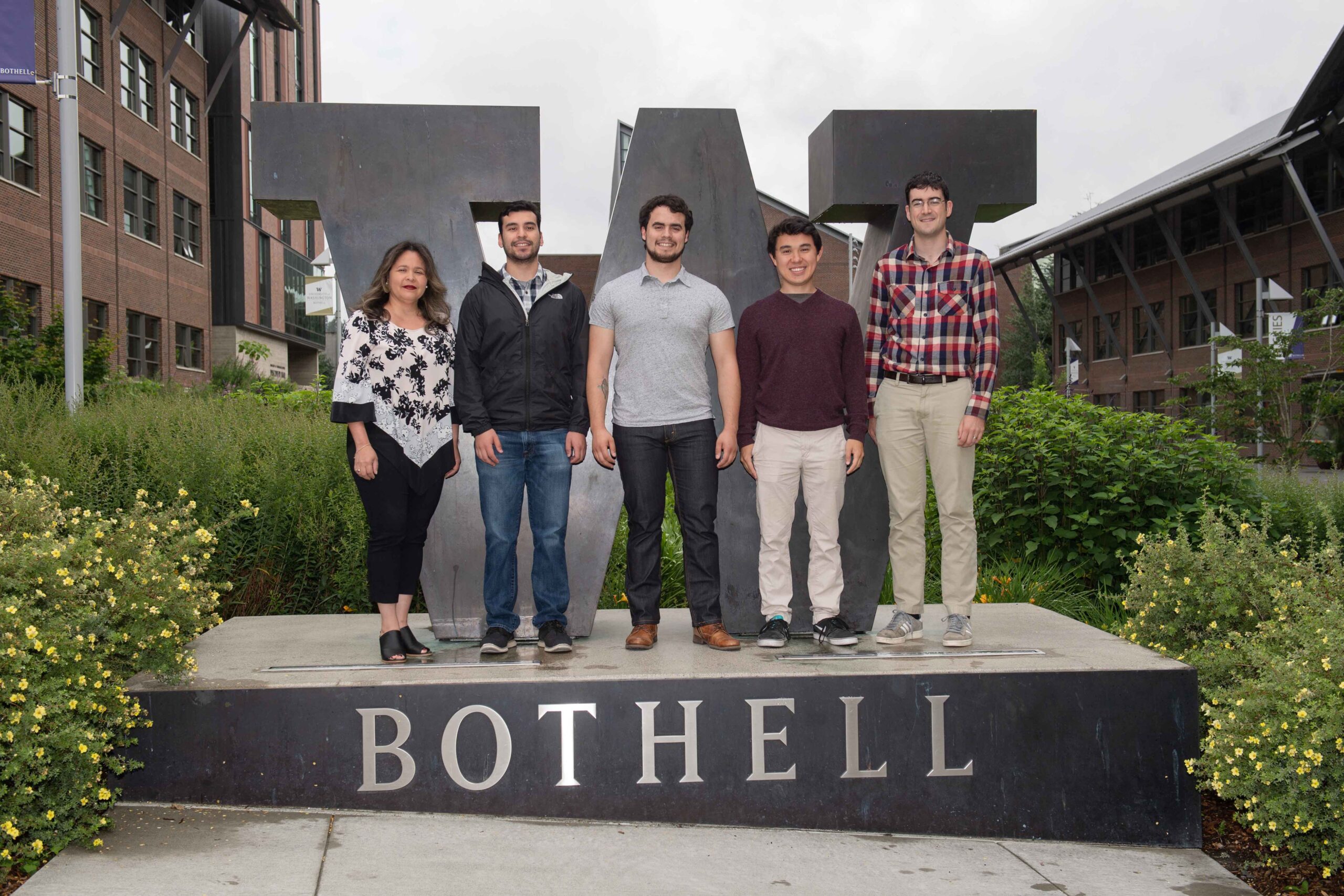 CT imaging group with their faculty mentor at the W Bothell statue