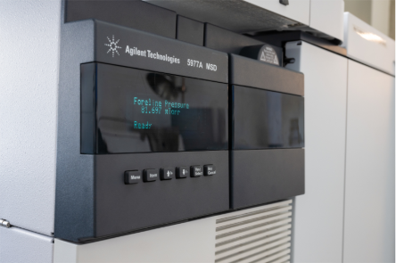 Close up of a Mass Selective Detector system with a screen and 6 buttons. Screen reads "Foreline Pressure 81.697 mTorr Ready"