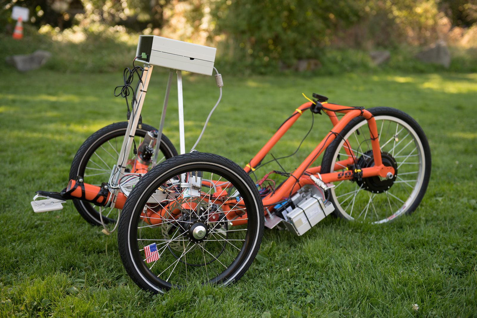 orange self-driving trike