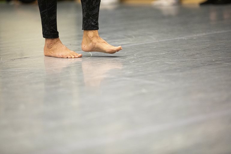 A dancer's bare feet.