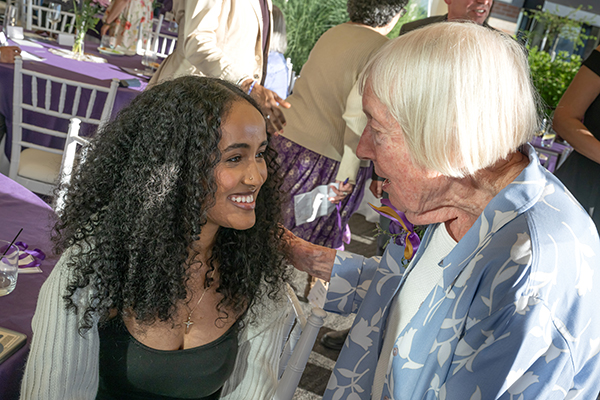 Candid photo of UW Bothell alumna Koket Gebiremichael and Anne Loustau.