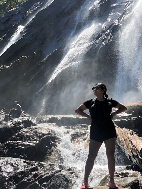 Diana Betancourt Macias at a waterfall.