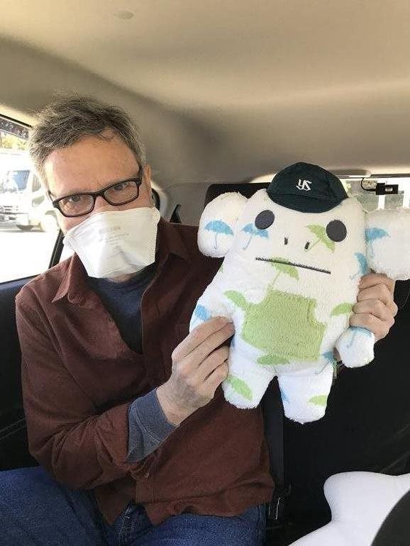 Goldstein holds the Tokyo Yakult Swallows baseball team's mascot