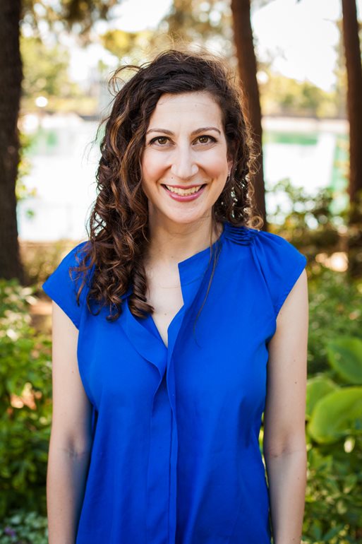 Profile of Deborah Hathaway smiling outdoors