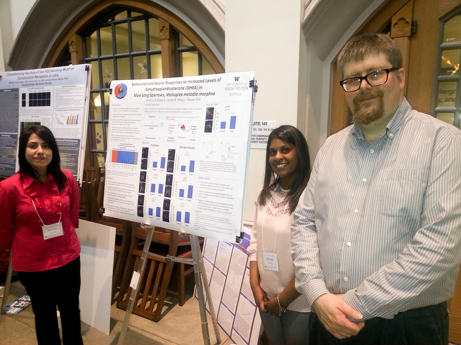 Doug Wacker with students, poster