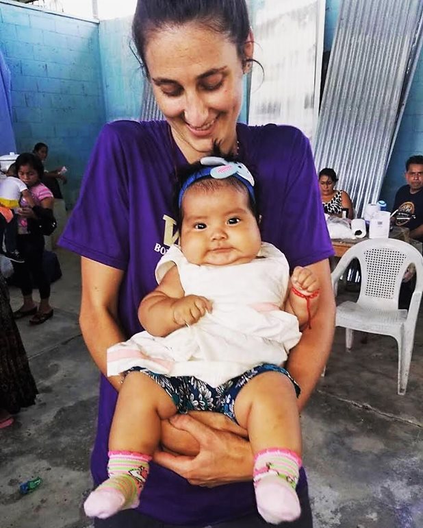 Samantha Bohn with baby in Guatemala