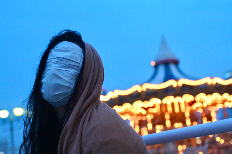 image of a person with their face fully covered in masks