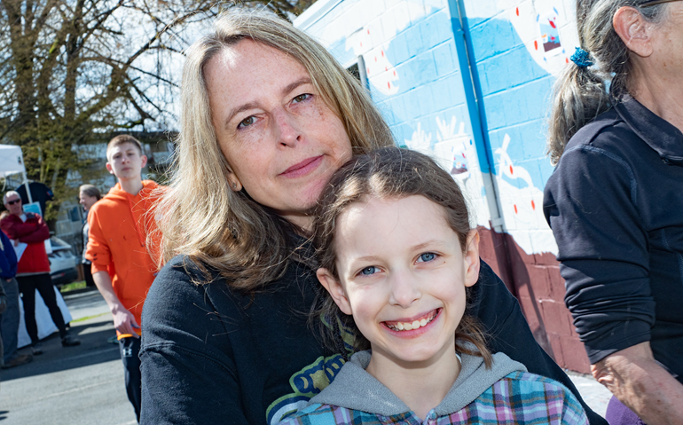 Kristin and Claire Wyatt, members in the Salmon Watcher program