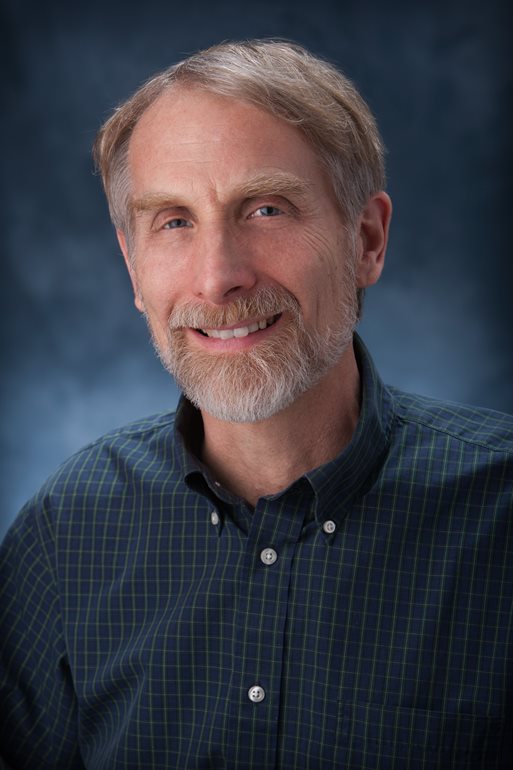 Professional headshot of Dr. David Stokes  